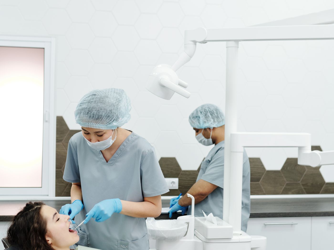 Dental prosthetic models displayed on a laboratory bench